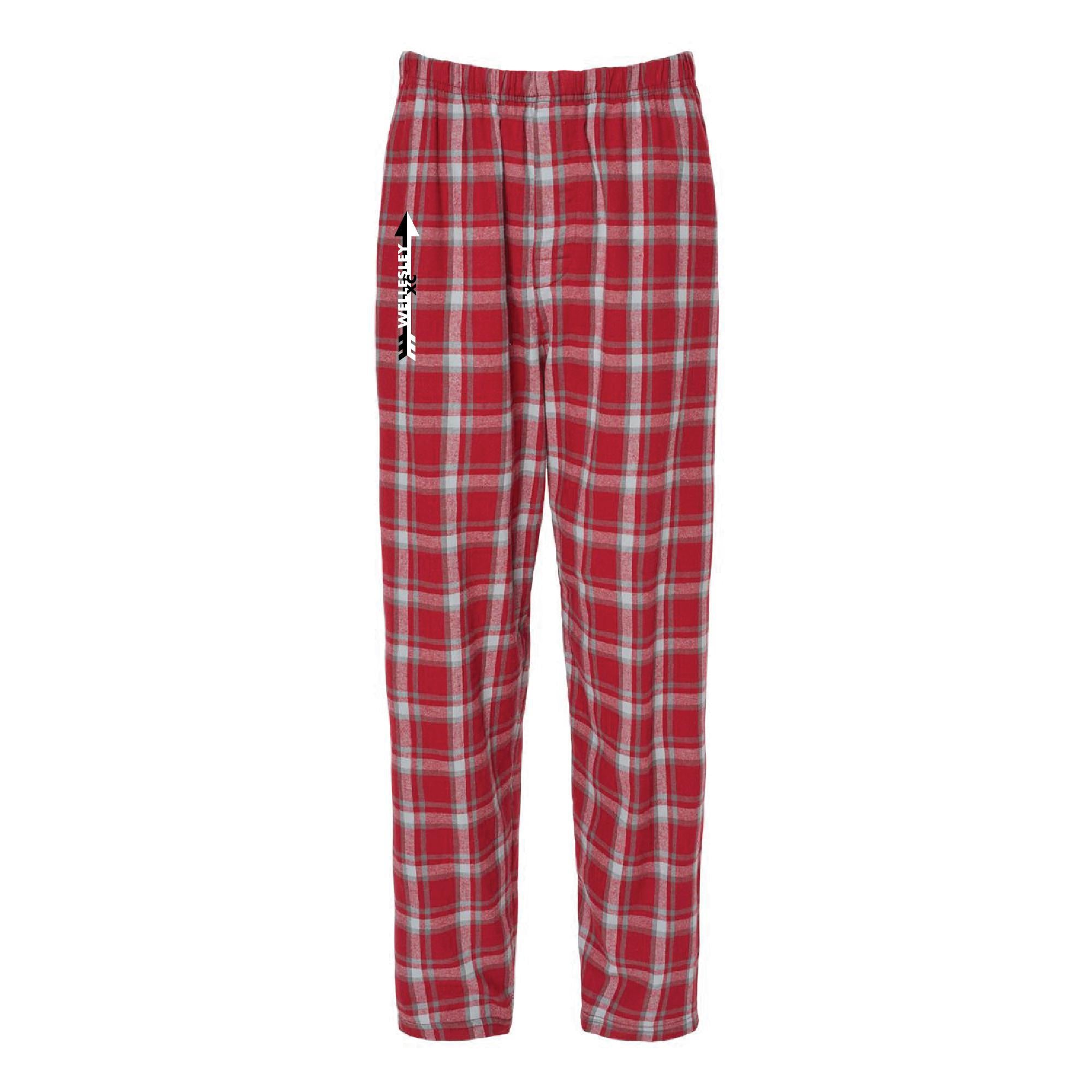 Red and white plaid flannel lounge pants with side pockets and self-folded waistband, featuring vertical text on the left leg. Comfortable and festive holiday-themed sleepwear for casual wear or relaxation.