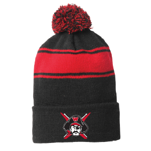 Charcoal gray and red striped knit beanie with large pom-pom on top. Features a Raiders logo patch with crossed swords and pirate face embroidered on the front cuff. Perfect for showing team spirit and staying warm during winter sports events.