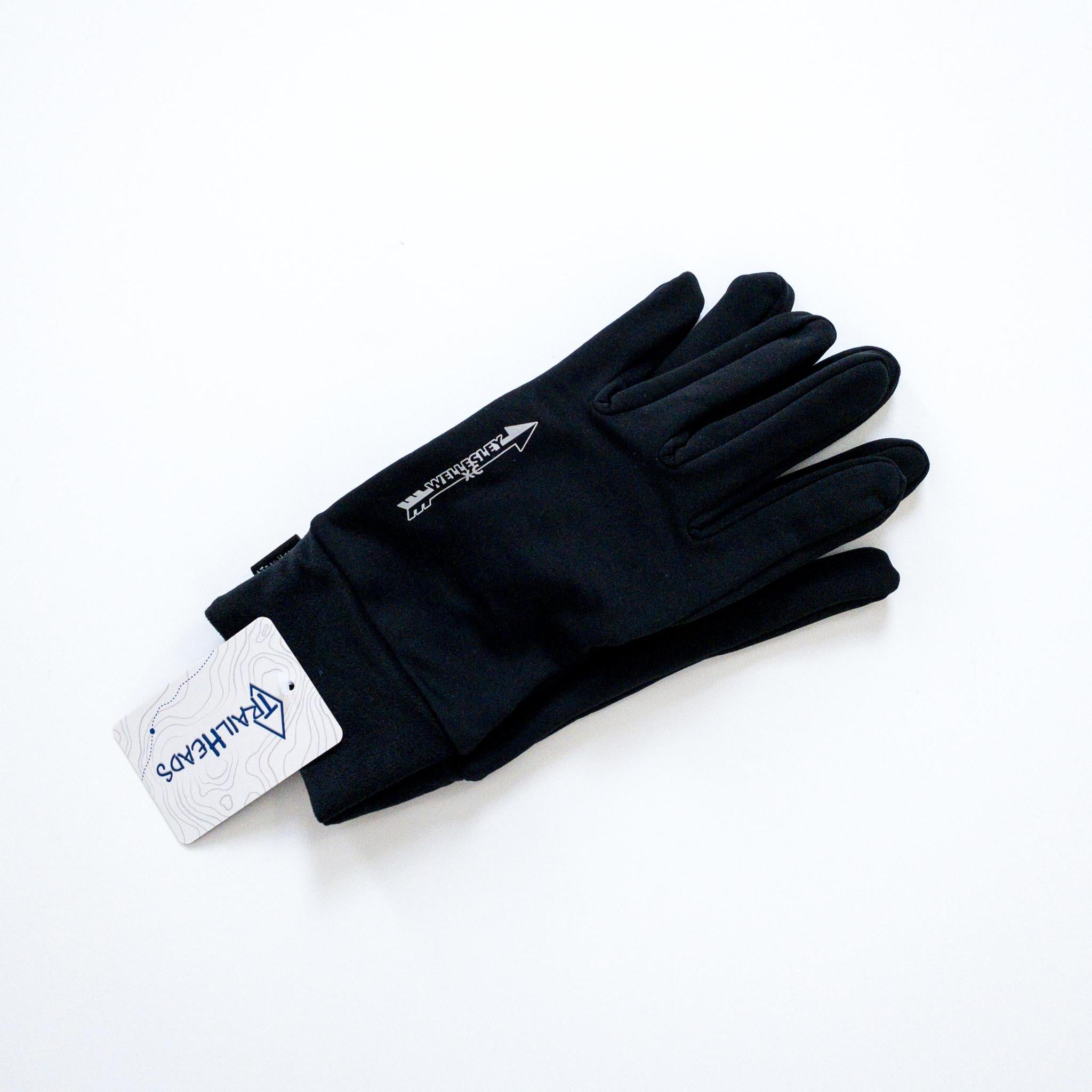 Black TrailHeads Elements Running Gloves with white tag, lightweight and stretchy for warmth without overheating during runs, featuring moisture-wicking fabric and secure double-layer cuffs